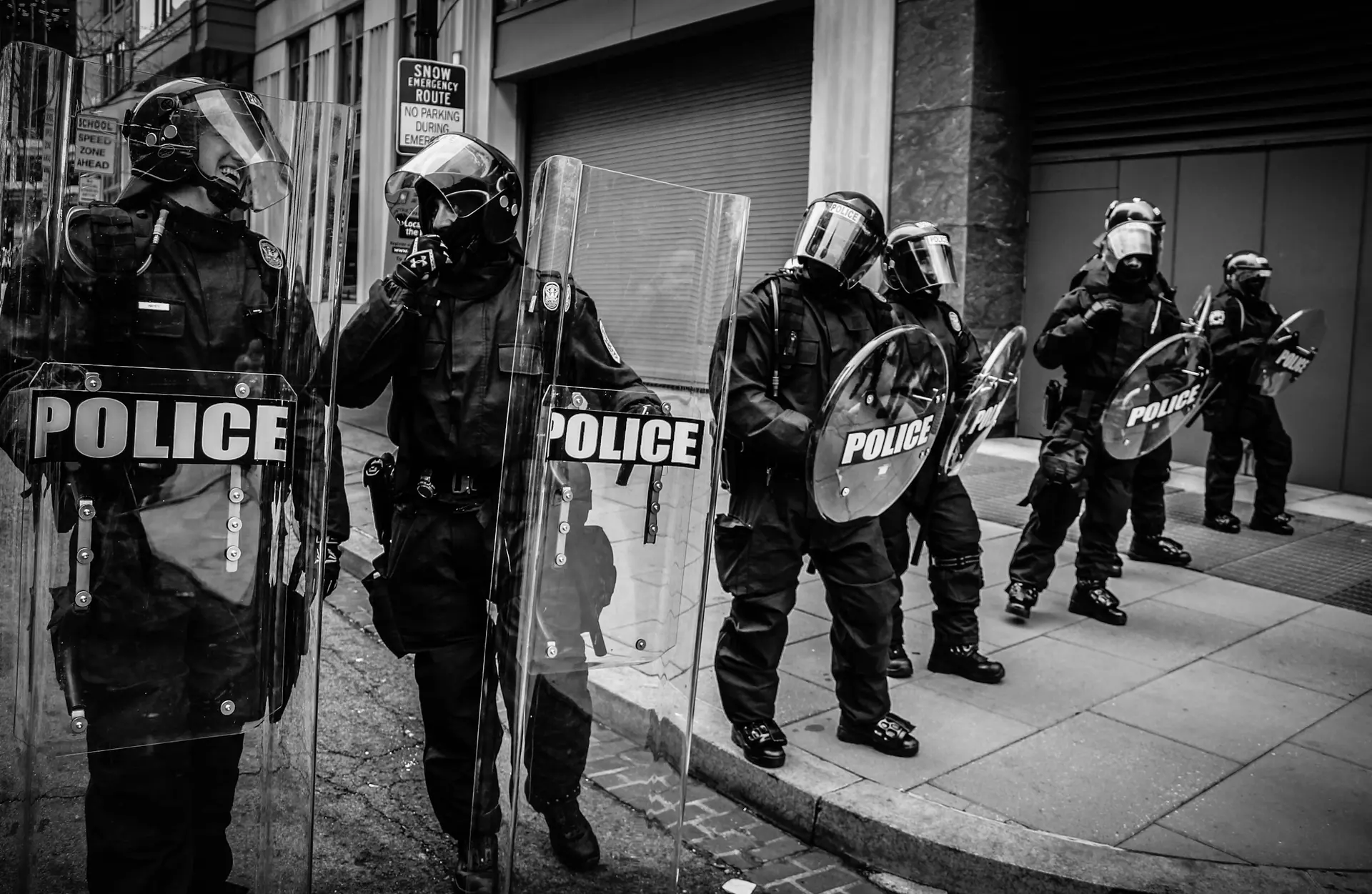 Public order police line with shields during civil unrest